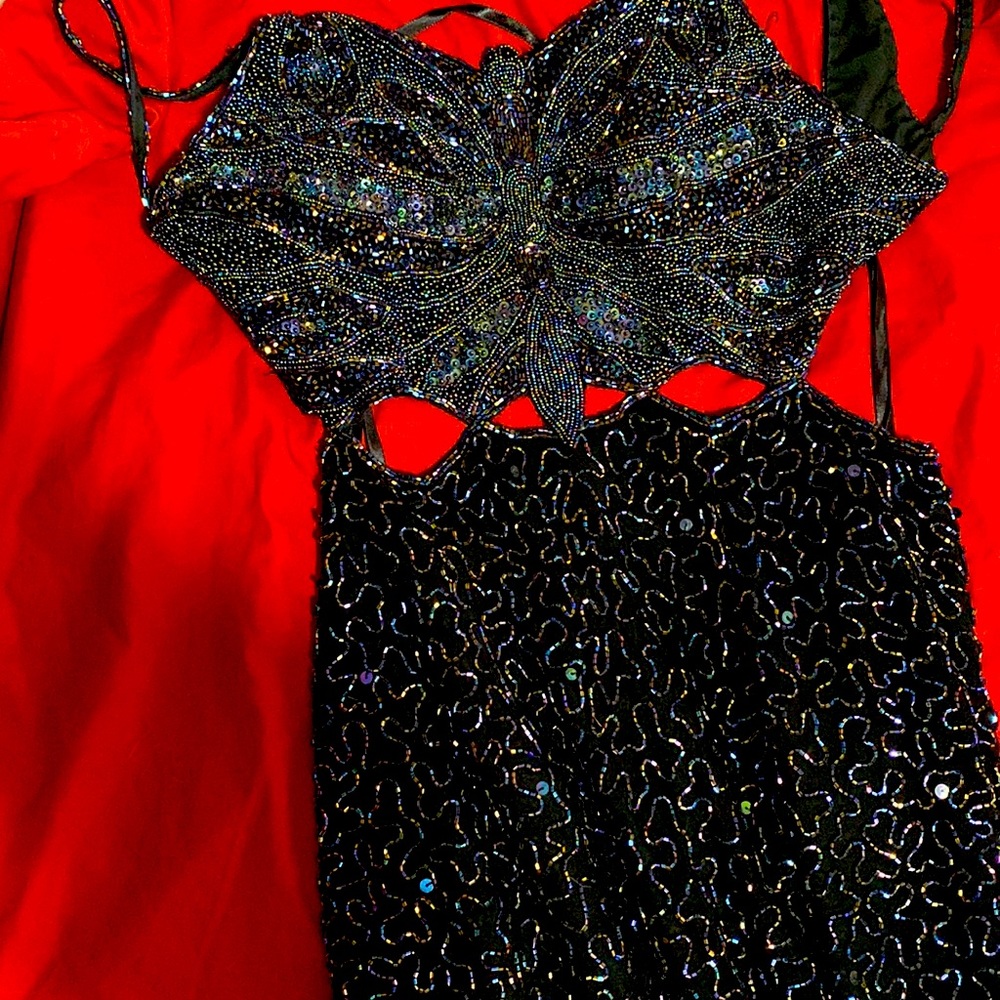 90s Donatello slim fit beaded dress with open back and two thigh slits.